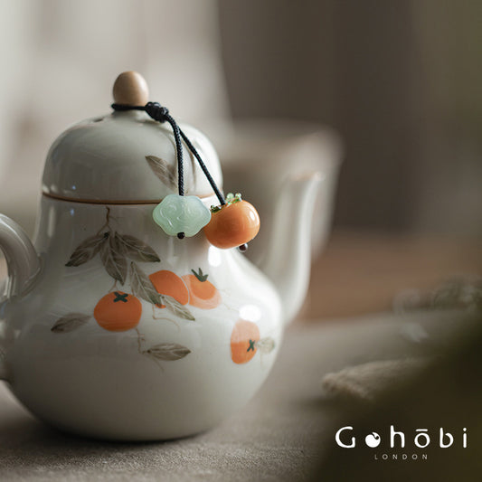Gohobi Persimmon Teapot Lid Pendant – Handwoven Retractable Teapot Lid Rope