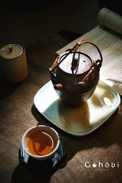 Gohobi Heat-Resistant Old Rock Mud Boiling Teapot – Coarse Pottery Beam-Lifted Stove Kettle (560ml)