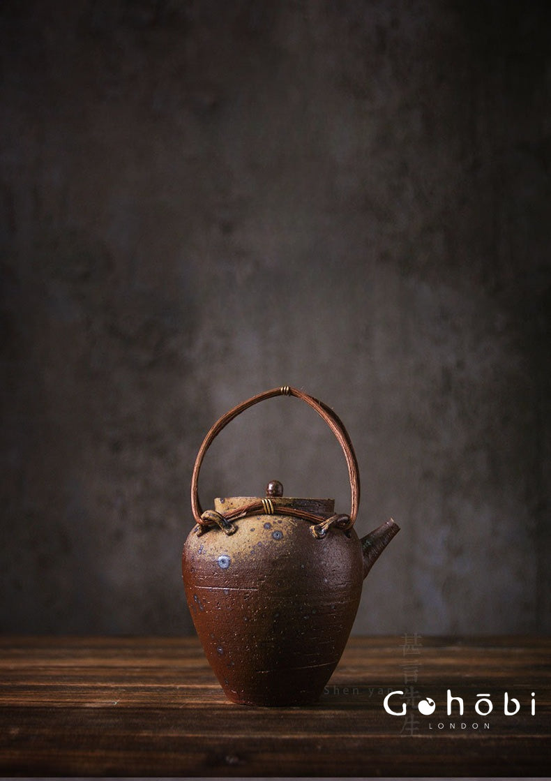 Gohobi Heat-Resistant Old Rock Mud Boiling Teapot – Coarse Pottery Beam-Lifted Stove Kettle (560ml)