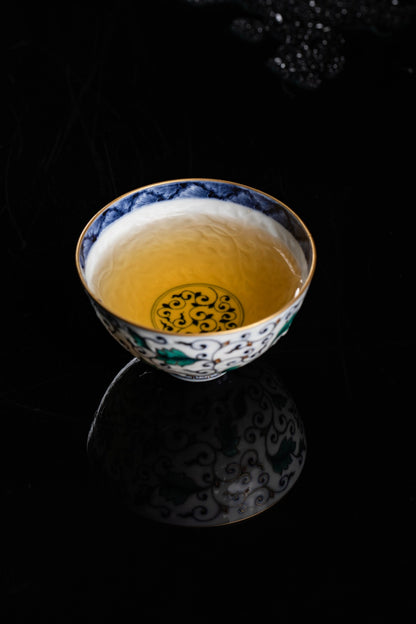 [清本源 x Gohobi Gallery] Inner-Molded Entwined Lotus Motif · Blue-and-White Doucai with Gilded “Golden Branch & Jade Leaf” Chicken-Heart Cup