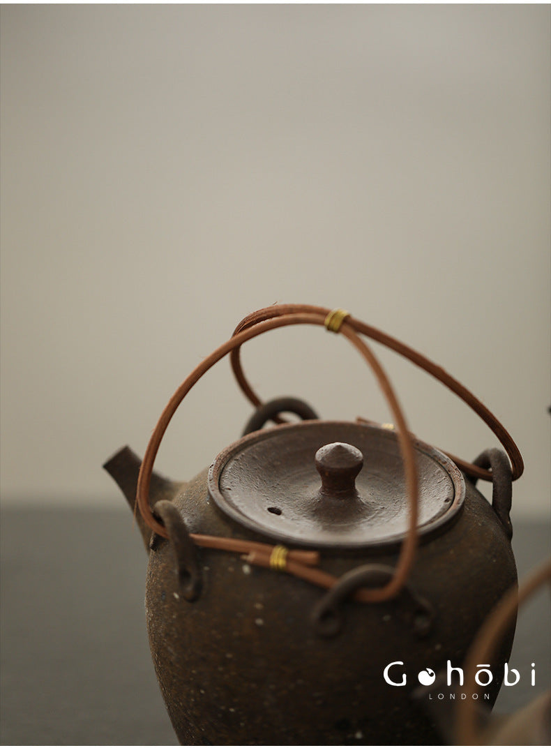 Gohobi Heat-Resistant Old Rock Mud Boiling Teapot – Coarse Pottery Beam-Lifted Stove Kettle (560ml)