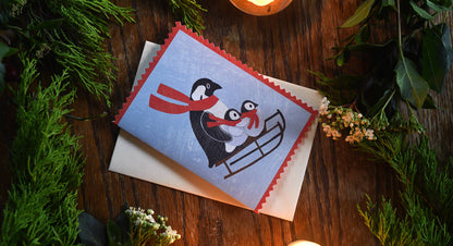 Mortlake Papers Penguin Family Christmas Card | Sledging Winter Holiday Card [Made in the UK]