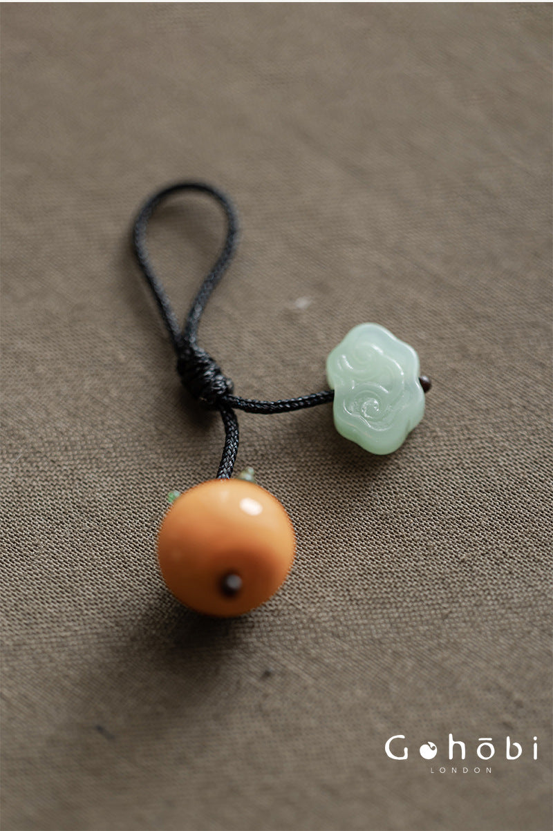Gohobi Persimmon Teapot Lid Pendant – Handwoven Retractable Teapot Lid Rope
