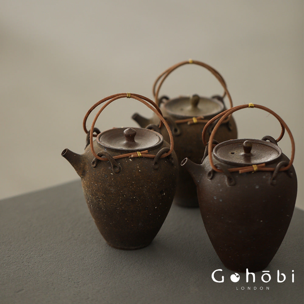 Gohobi Heat-Resistant Old Rock Mud Boiling Teapot – Coarse Pottery Beam-Lifted Stove Kettle (560ml)