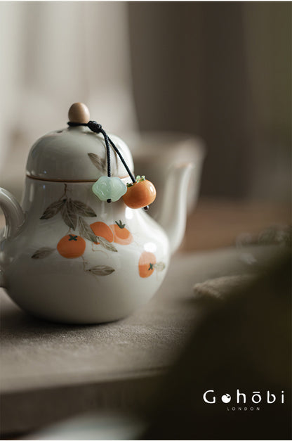 Gohobi Persimmon Teapot Lid Pendant – Handwoven Retractable Teapot Lid Rope