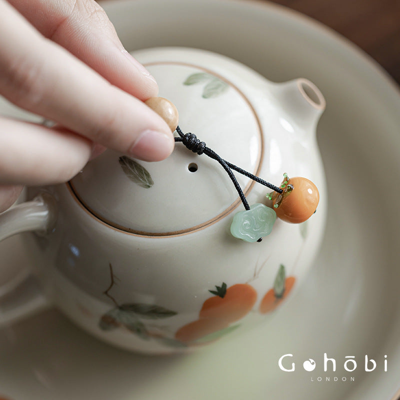 Gohobi Persimmon Teapot Lid Pendant – Handwoven Retractable Teapot Lid Rope