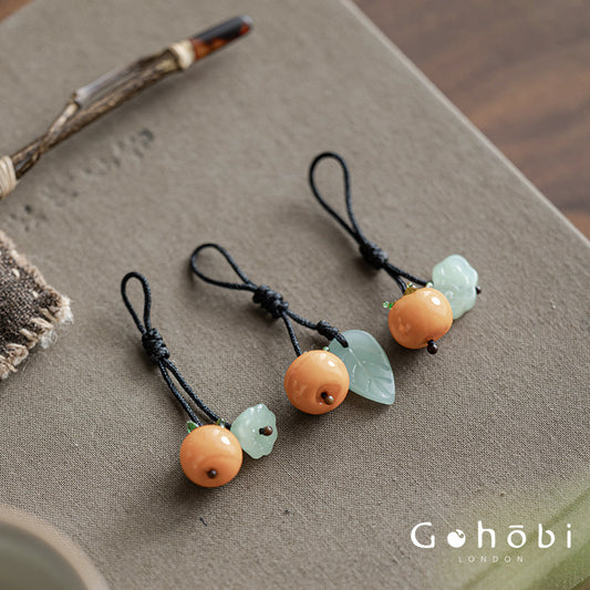 Gohobi Persimmon Teapot Lid Pendant – Handwoven Retractable Teapot Lid Rope