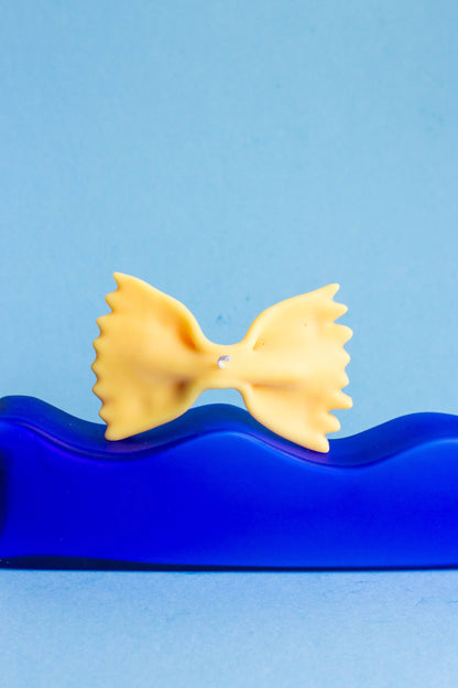 HereThe Farfalle Candle