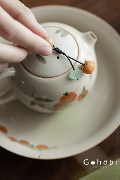 Gohobi Persimmon Teapot Lid Pendant – Handwoven Retractable Teapot Lid Rope